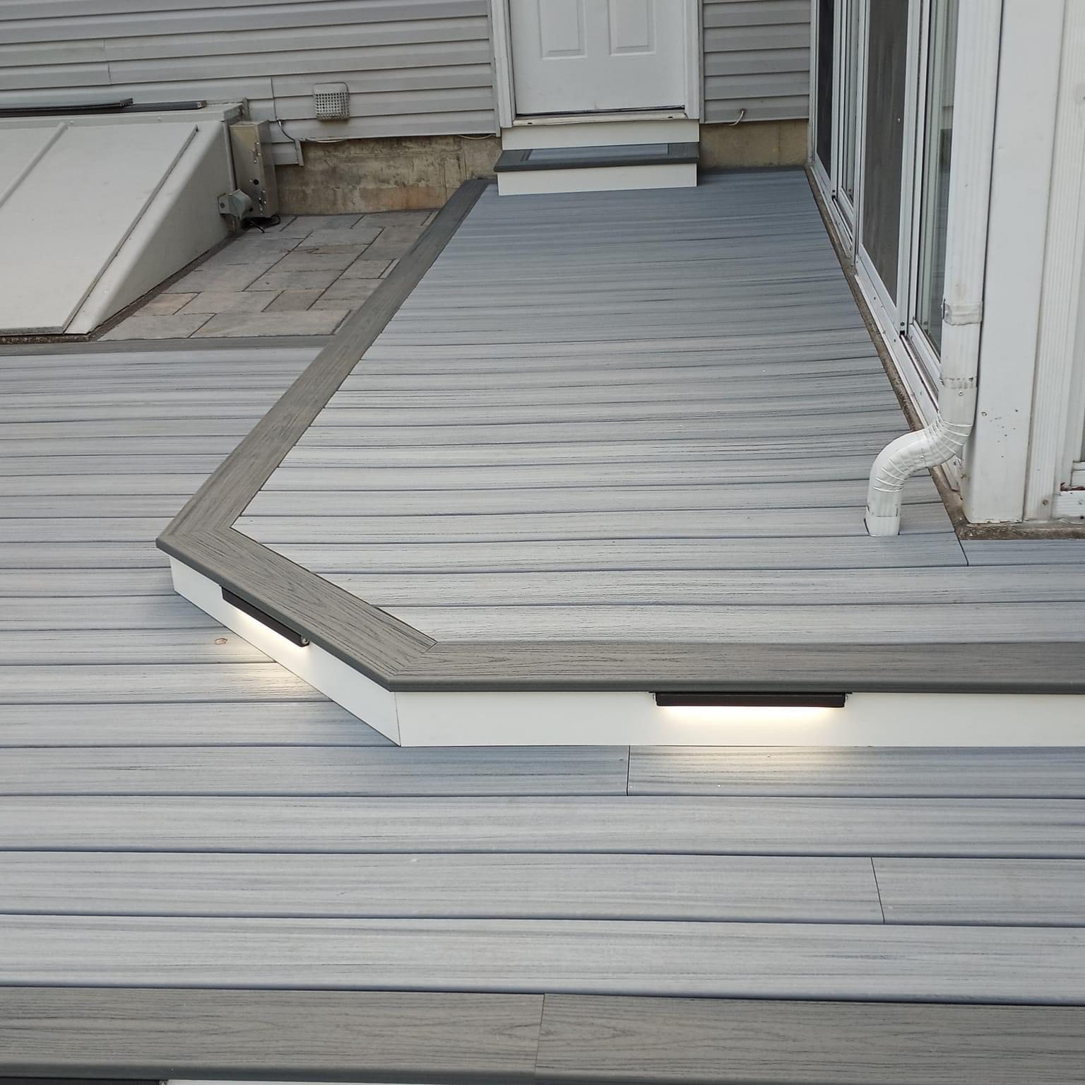 Custom cedar deck with integrated lighting - Lincoln