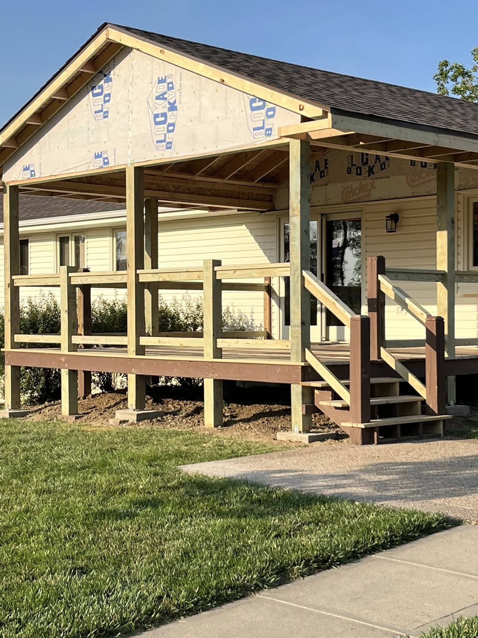 Clean charcoal fiber-cement siding install - Papillion