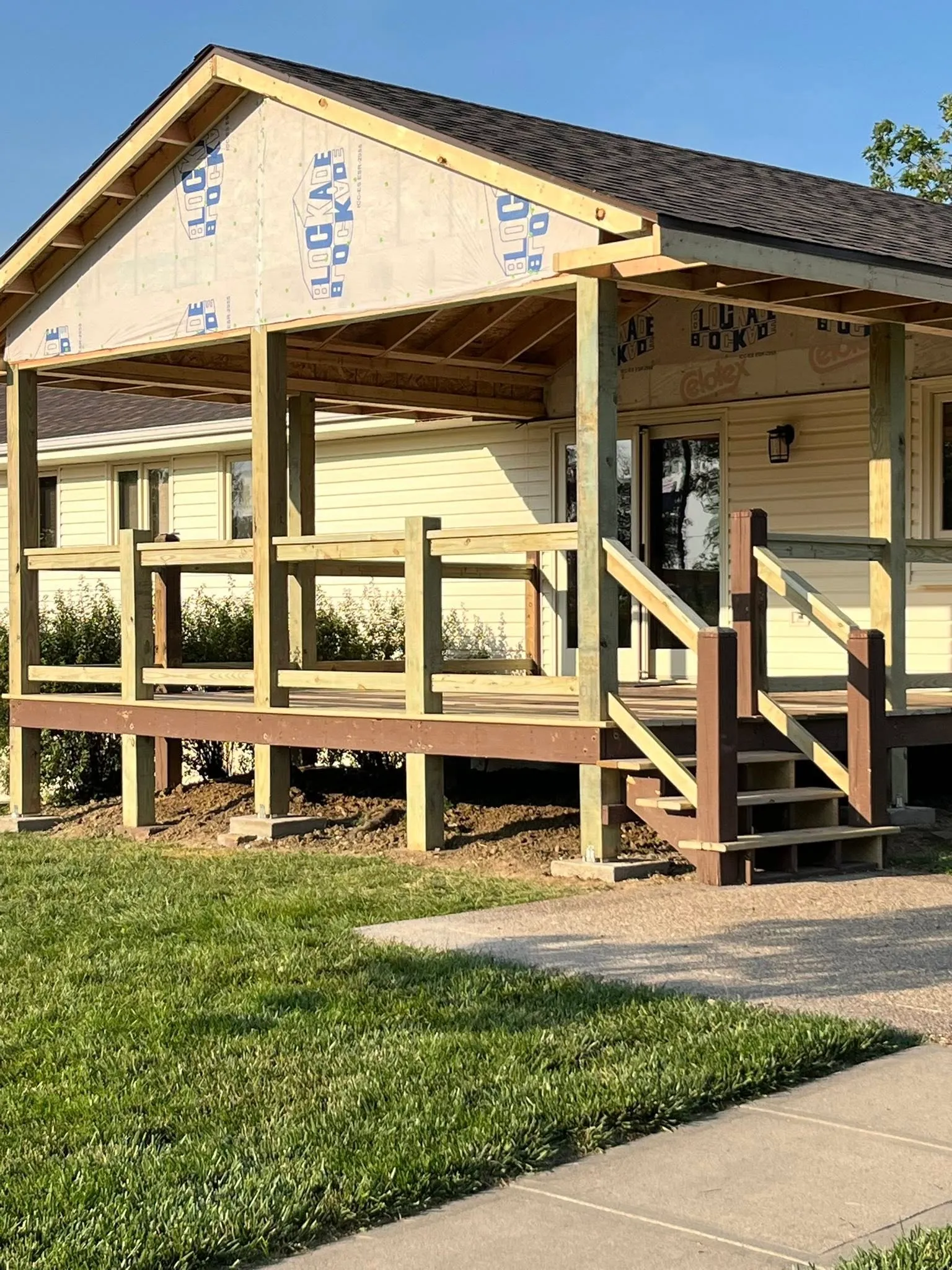 Clean charcoal fiber-cement siding install - Papillion